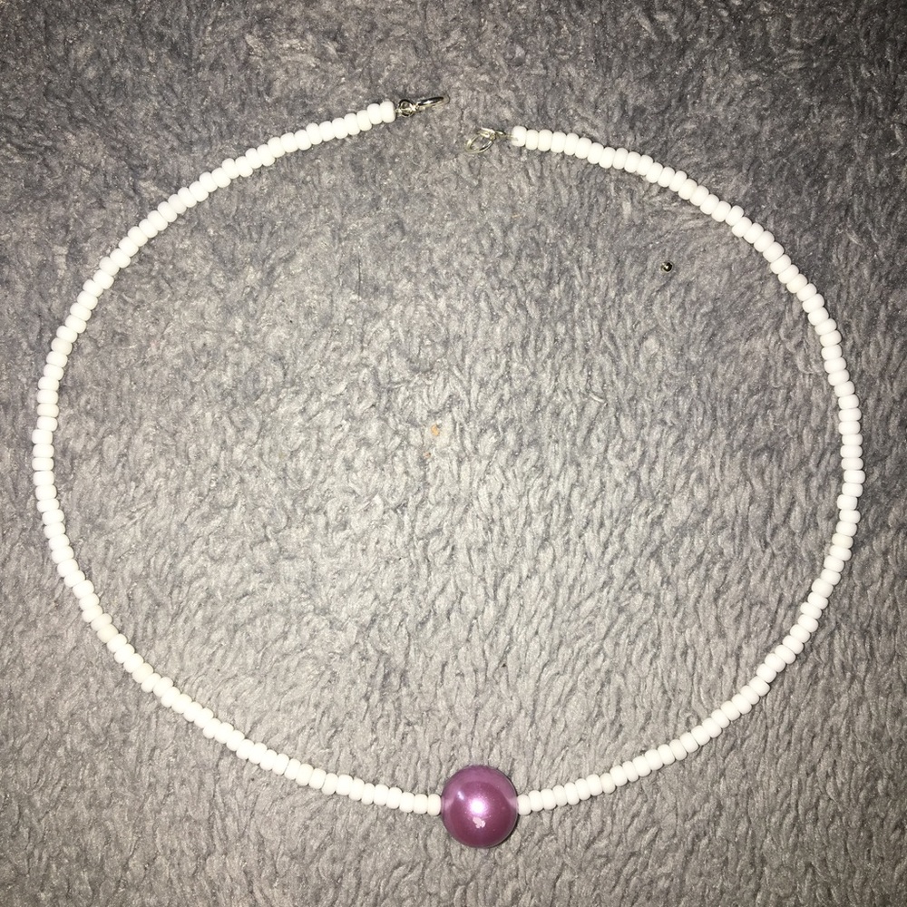 White choker with purple accent bead
