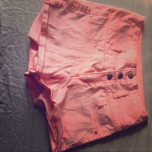 Bright pink high waisted shorts