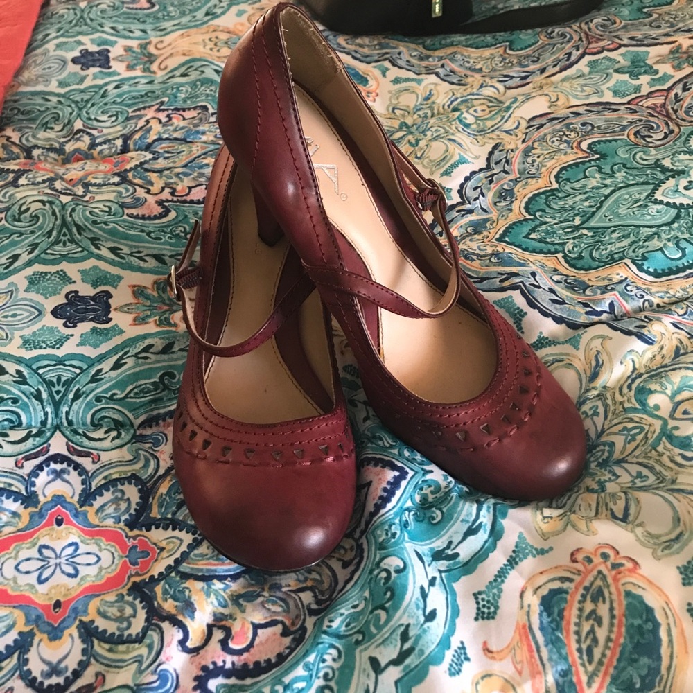 Red leather pumps
