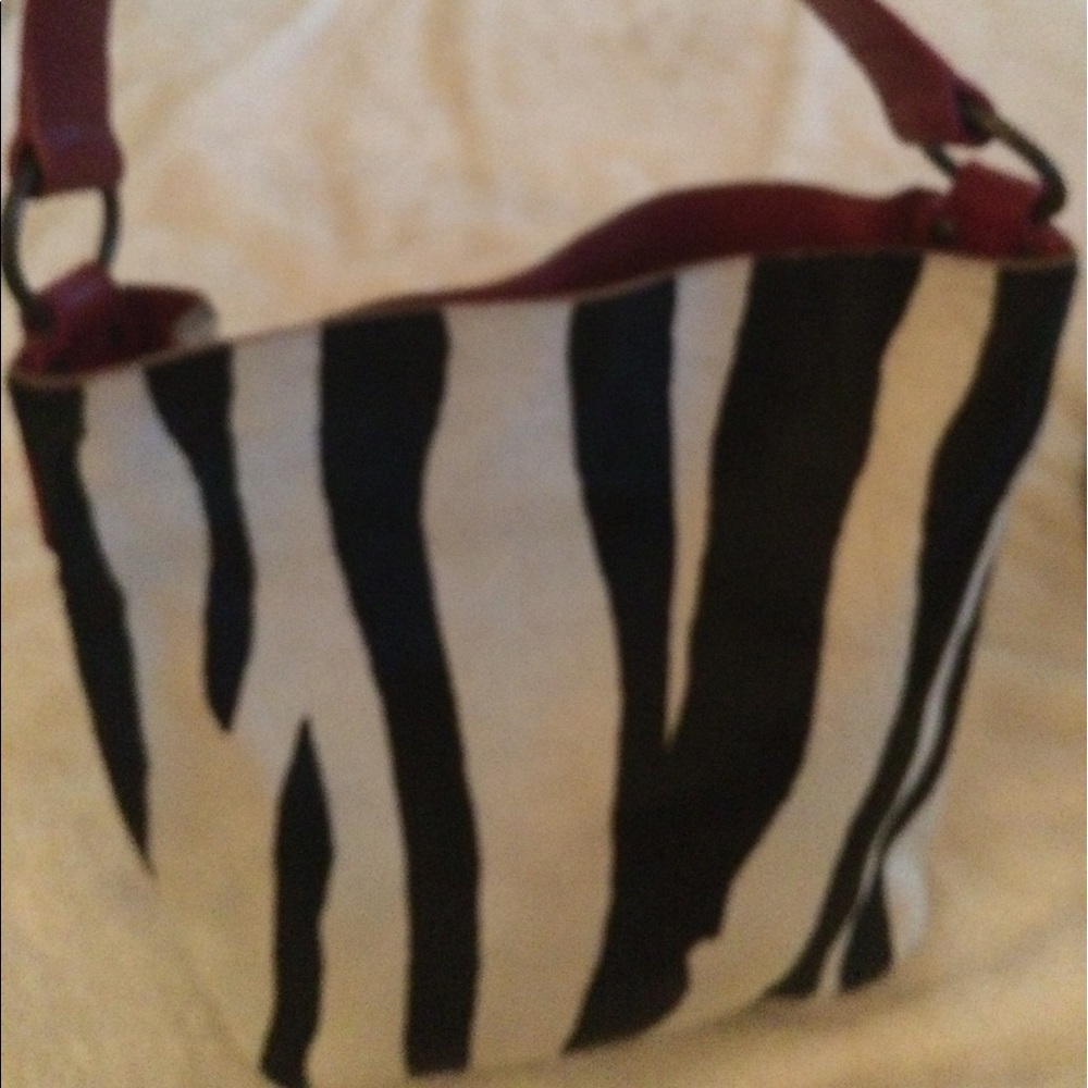 Mauricio Taiuti leather hobo