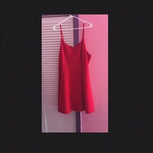 A red form fitting dress