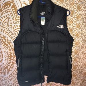 Black North Face puffy vest