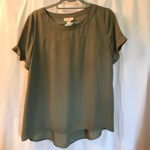 Olive green shirt.