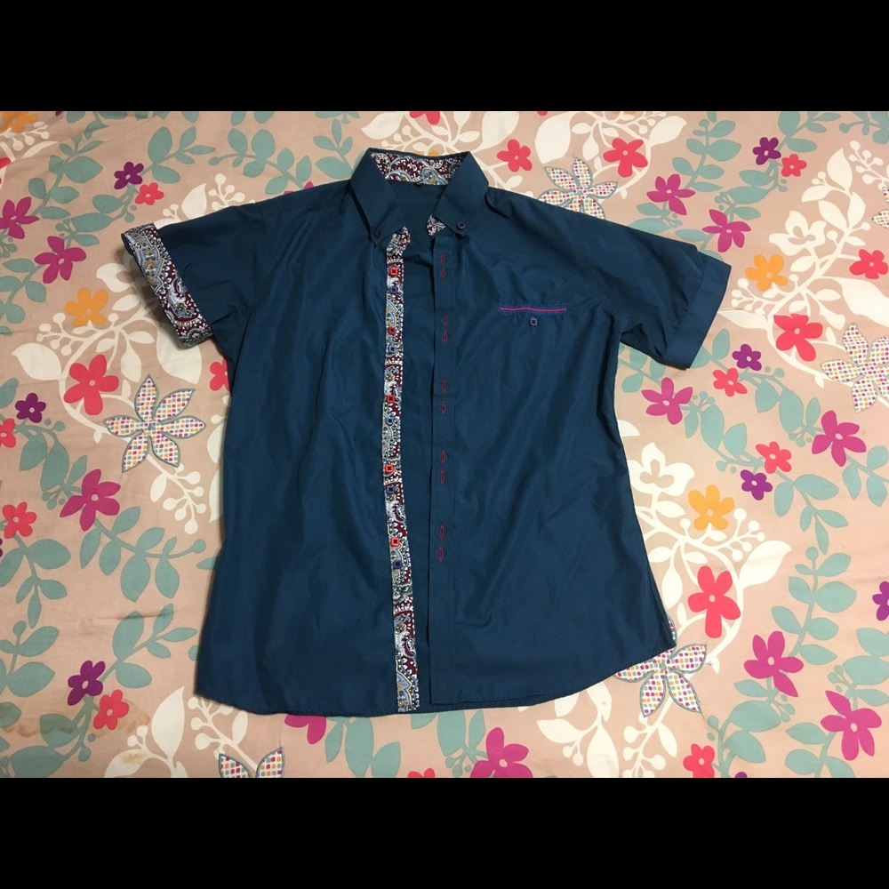 Blue collared button up shirt