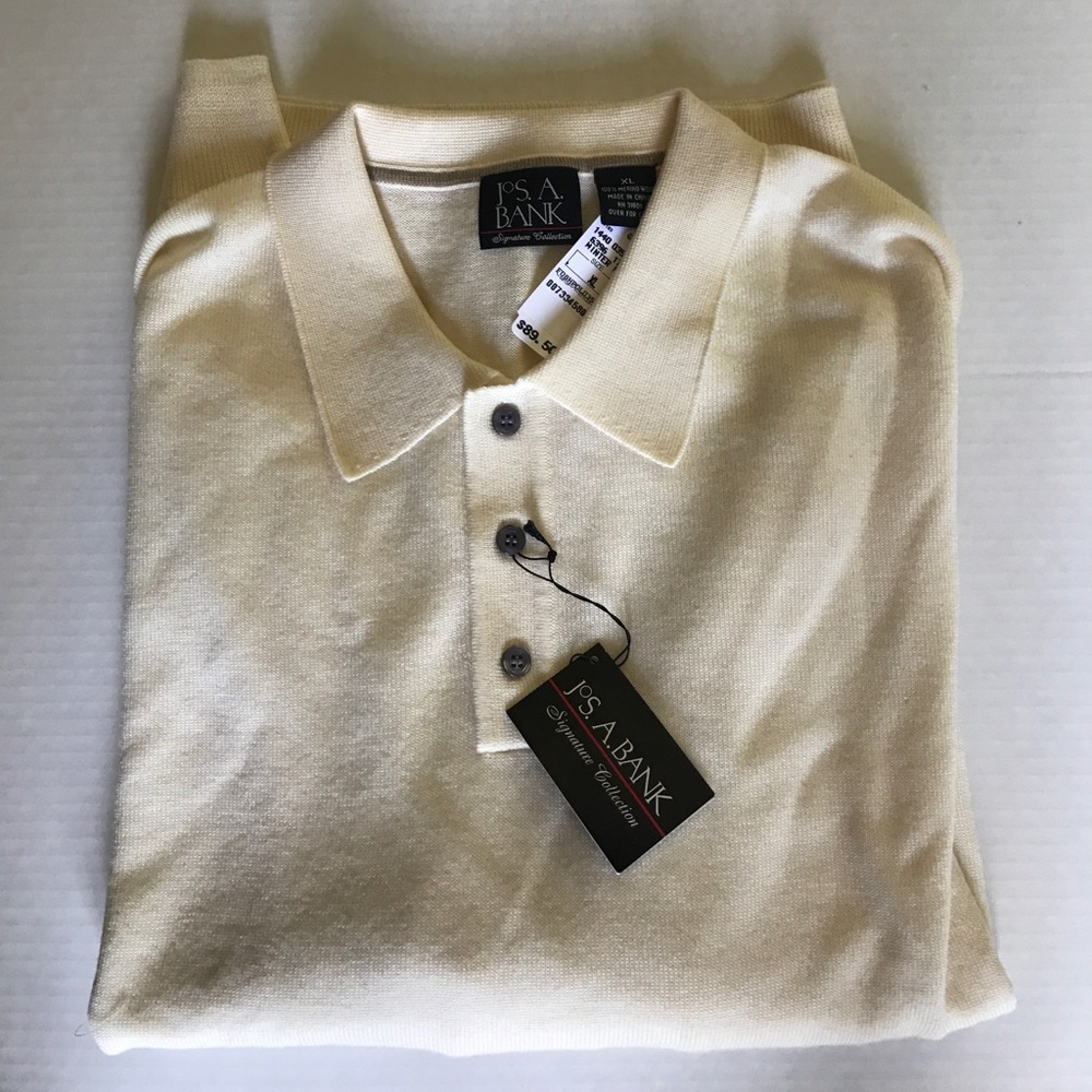 Pale yellow sweater NWT.