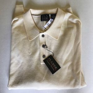 Pale yellow sweater NWT.