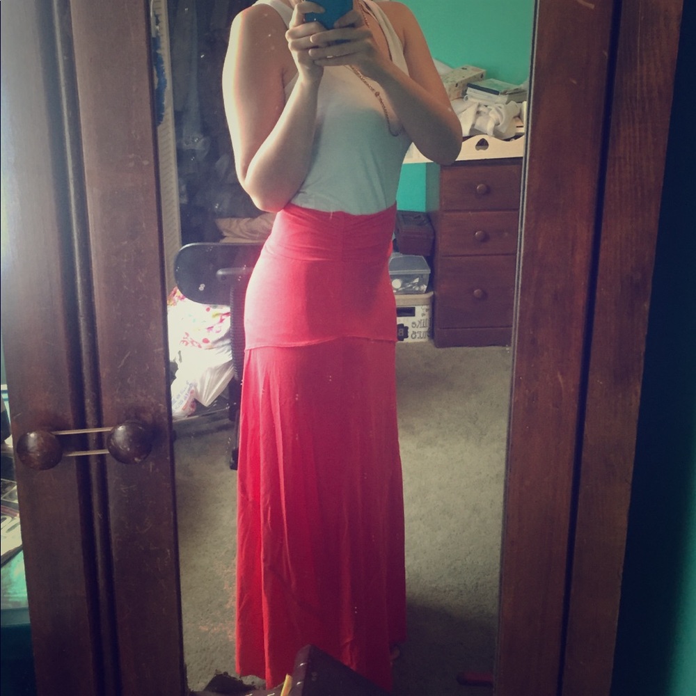 This is a long, orange/peach colored skirt