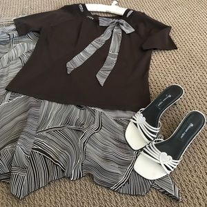 2 1/2 inch Etienne Aigner sling pump.