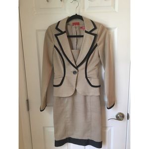 Two piece dress suit.