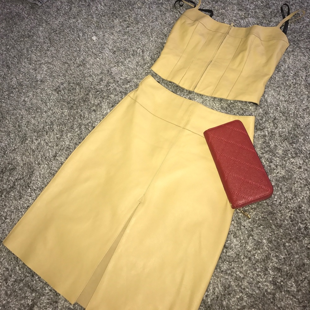 100% authentic Bebe gold skirt and top set