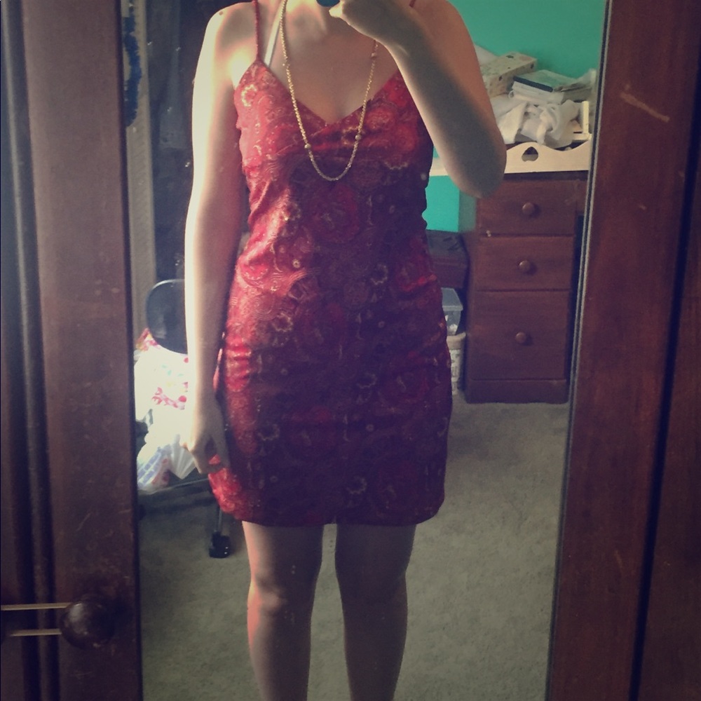 This is a unique red patterned dress