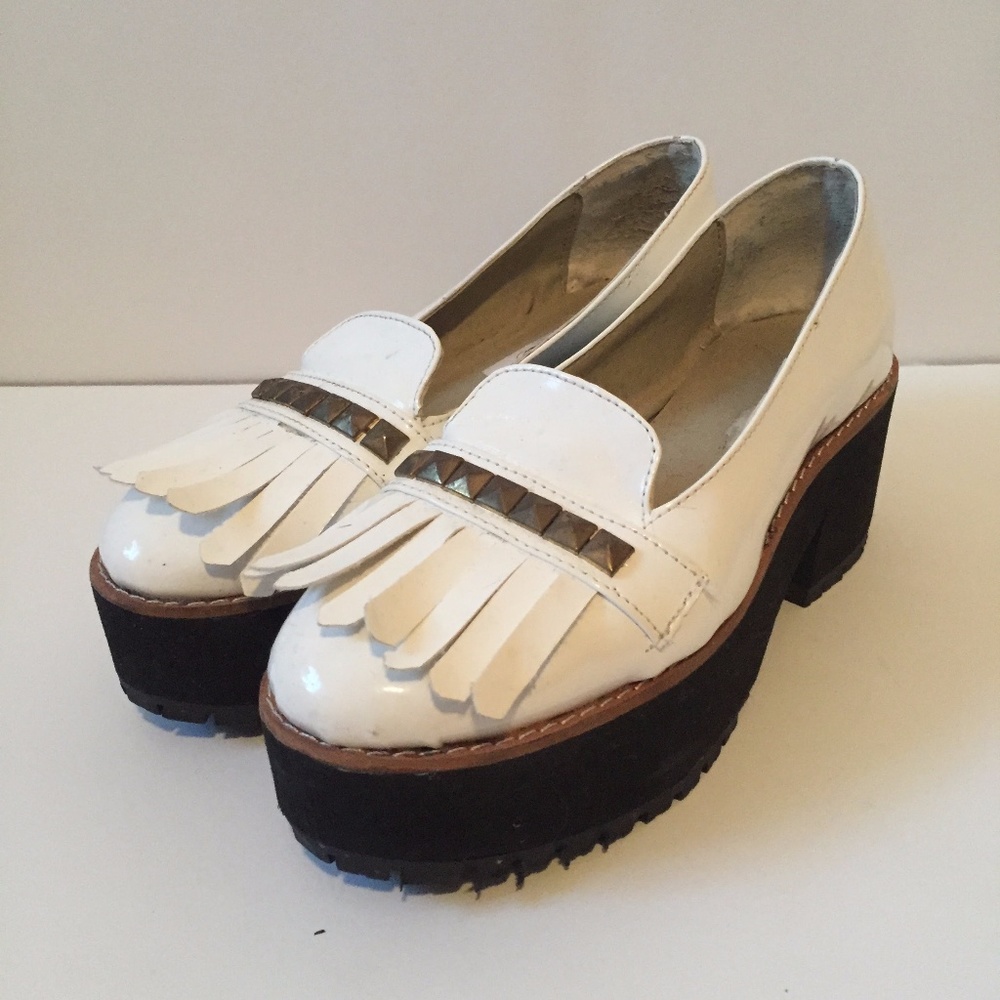 Cute white platform moccasins.