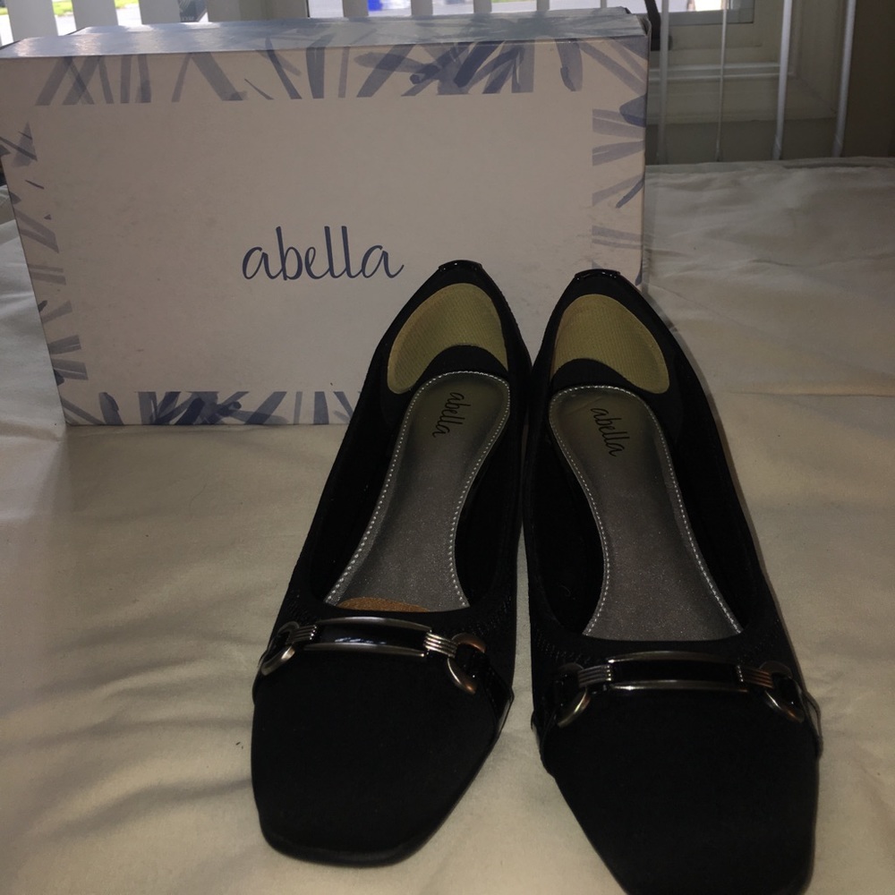 Black wedge buckle heels