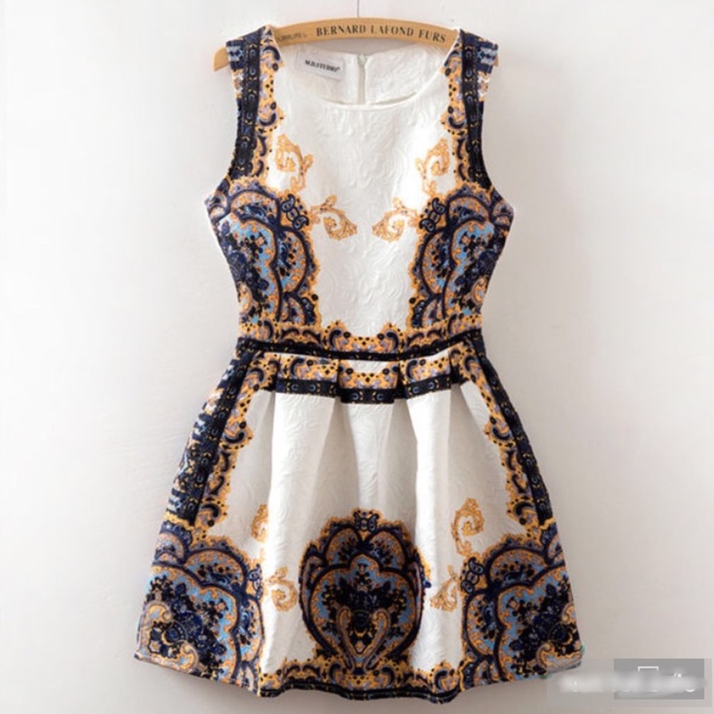 White dress with gold and navy accents