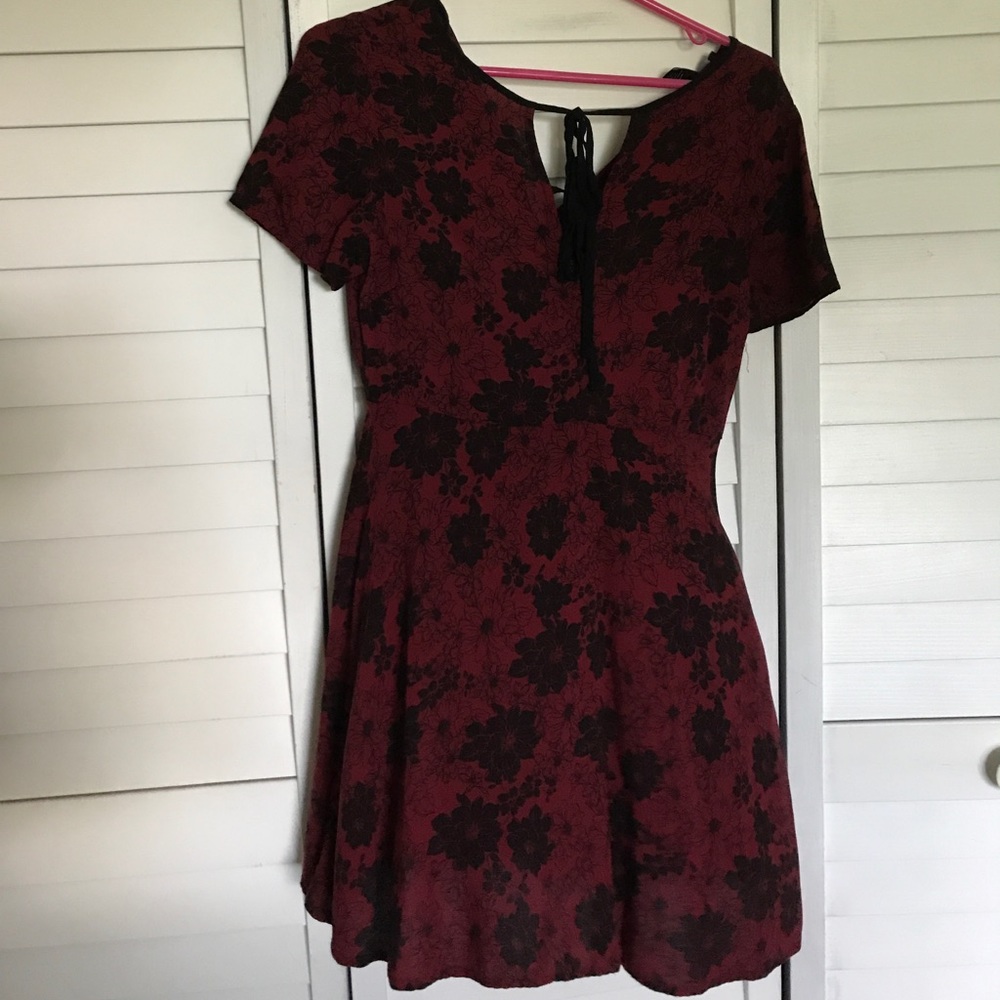 Dark red dress with black floral pattern