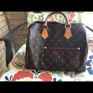 LV Limited Edition perforated purse