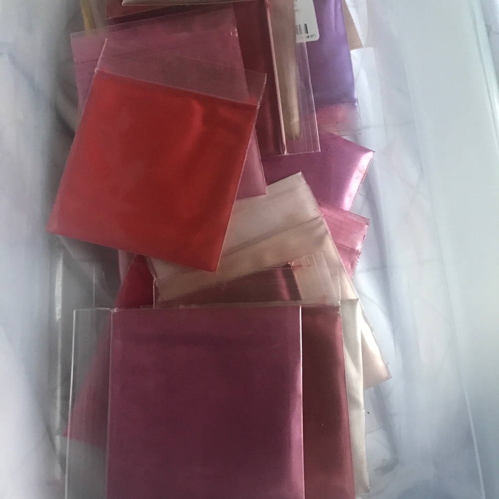 28 packs of lip and eye shadow colors