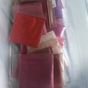 28 packs of lip and eye shadow colors