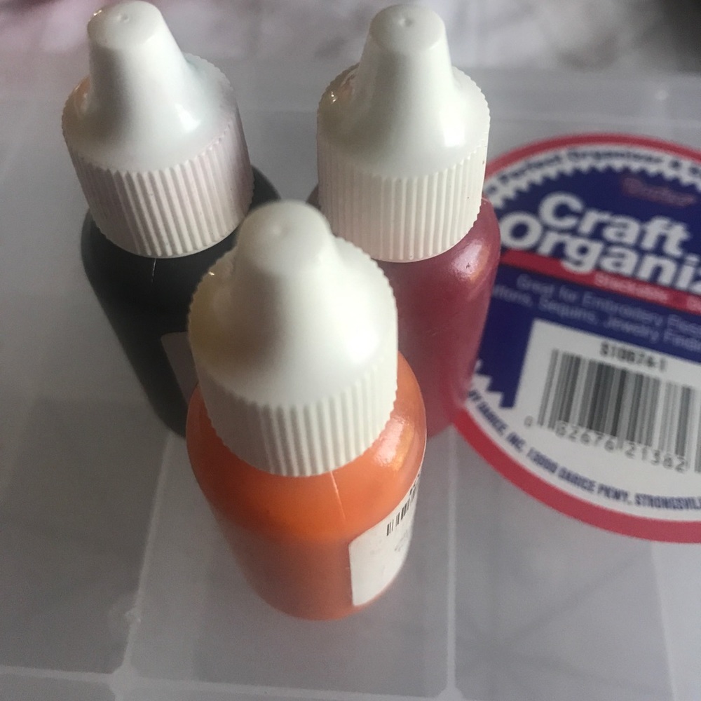 3 bottles of liquid lip colors