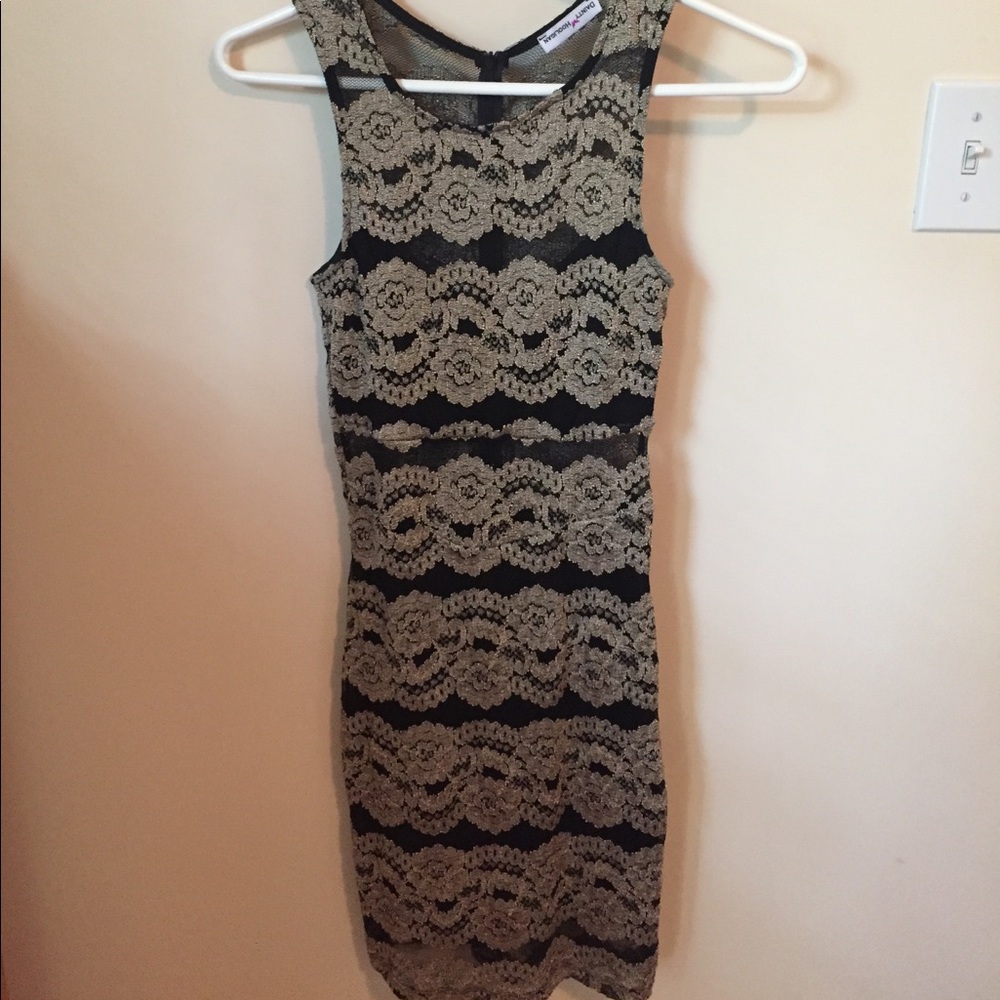 Black and gold lacy body con dress