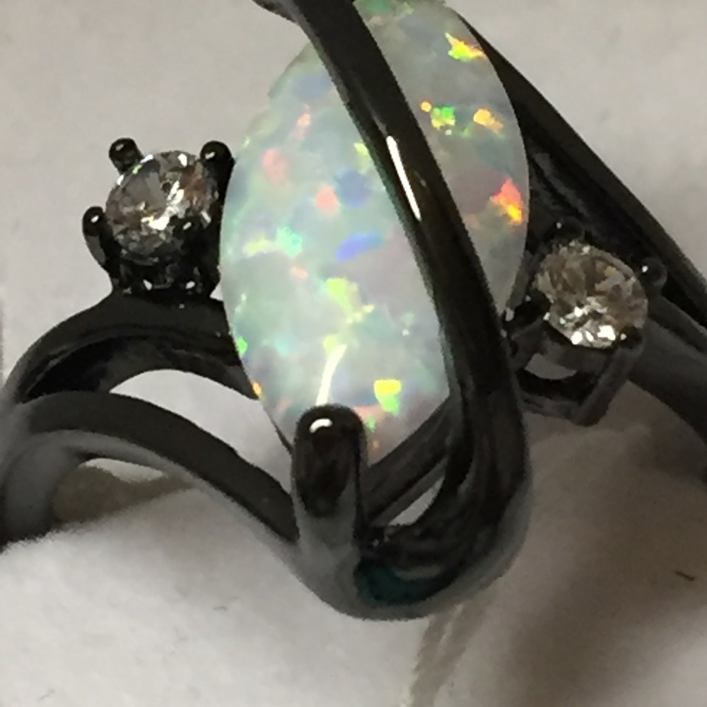 ring oval fire opal in black gold filled