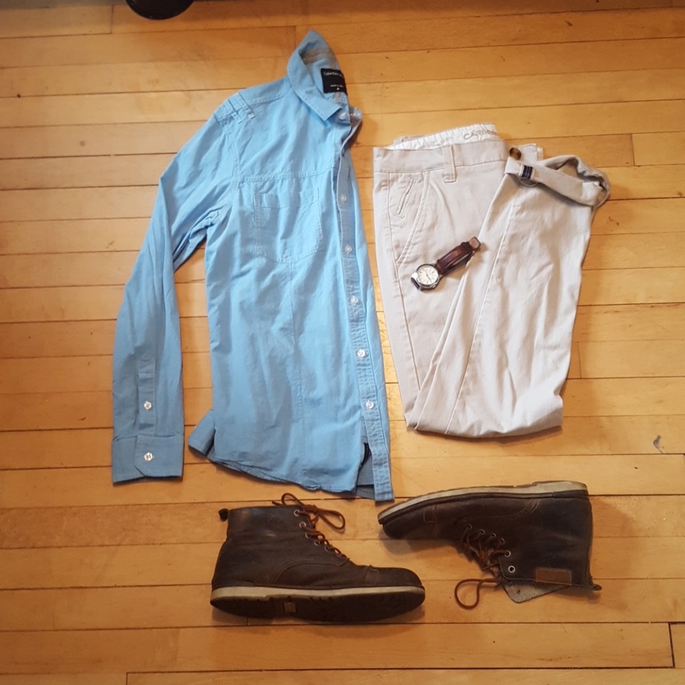 Blue button down shirt.