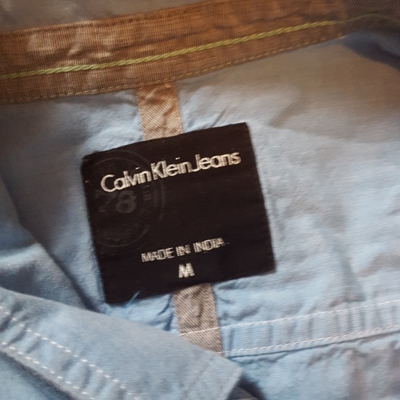 Blue button down shirt. - Picture 2 of 3