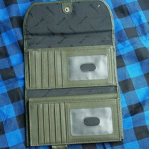 Green Rolfs leather wallet.