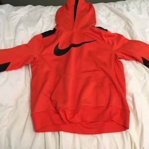 Orange Nike sweatshirt