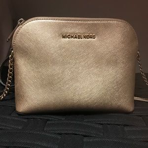 Michael kors gold cross body bag