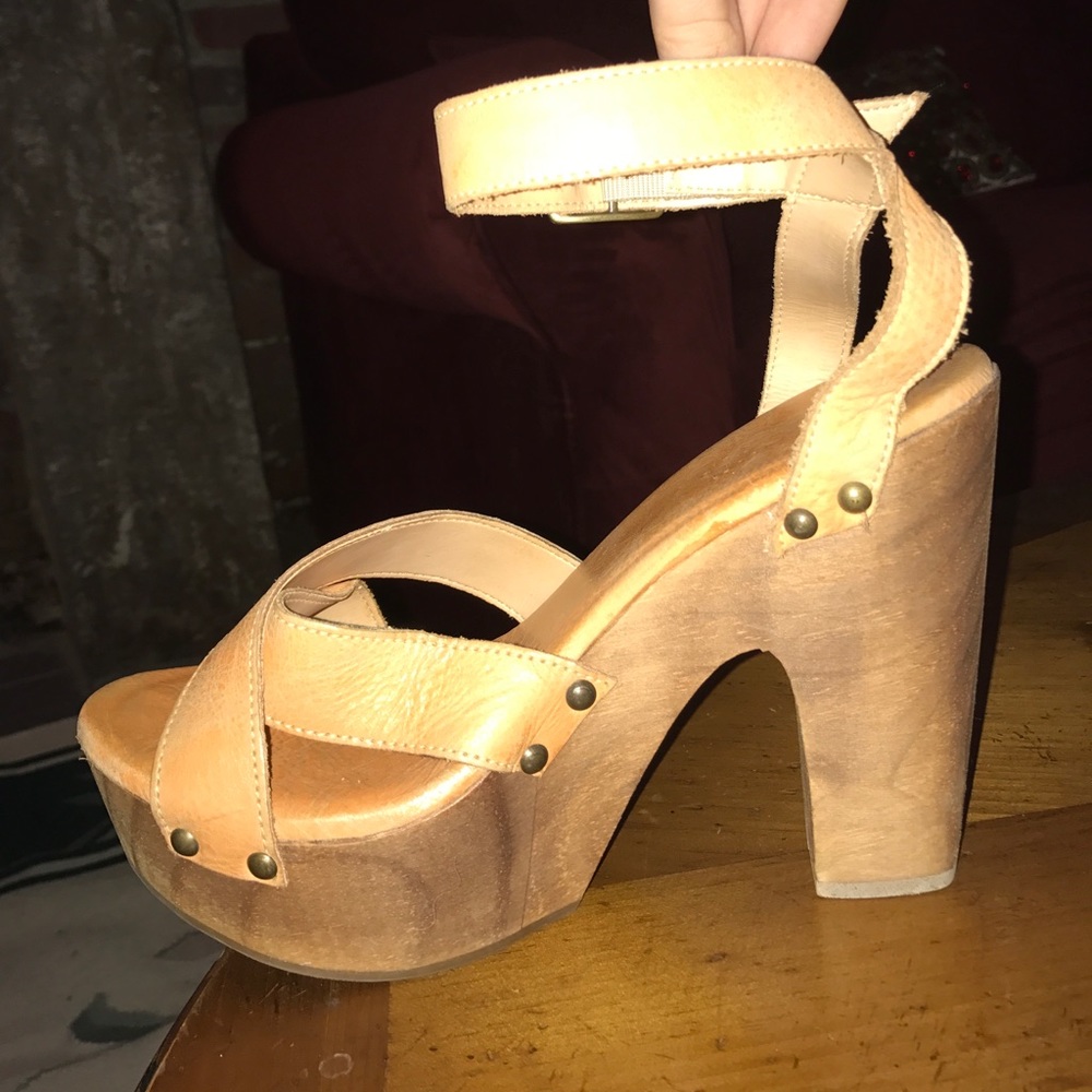 Leather ankle-strap platforms. Crafted in Mexico