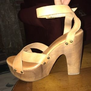 Leather ankle-strap platforms. Crafted in Mexico