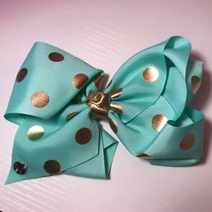 Jojo bow mint green with gold polka dots. NWOT