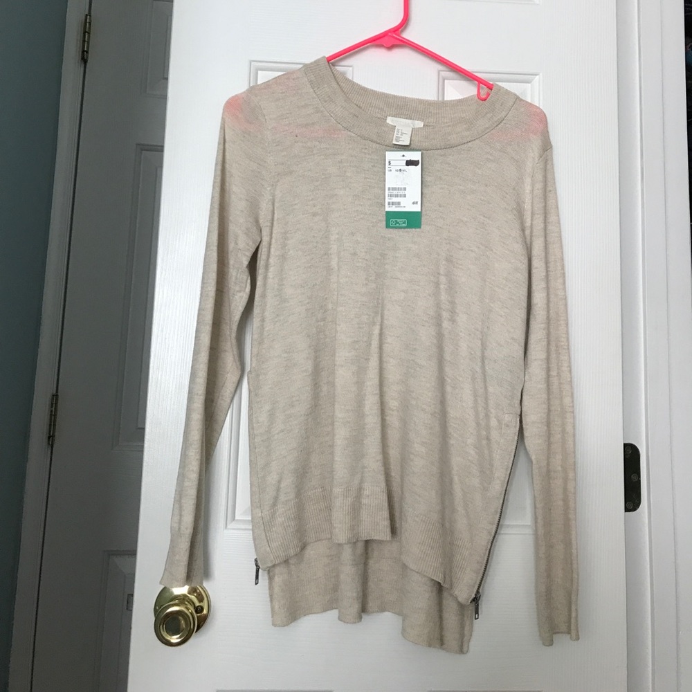 Adorable sweater with accent zipper