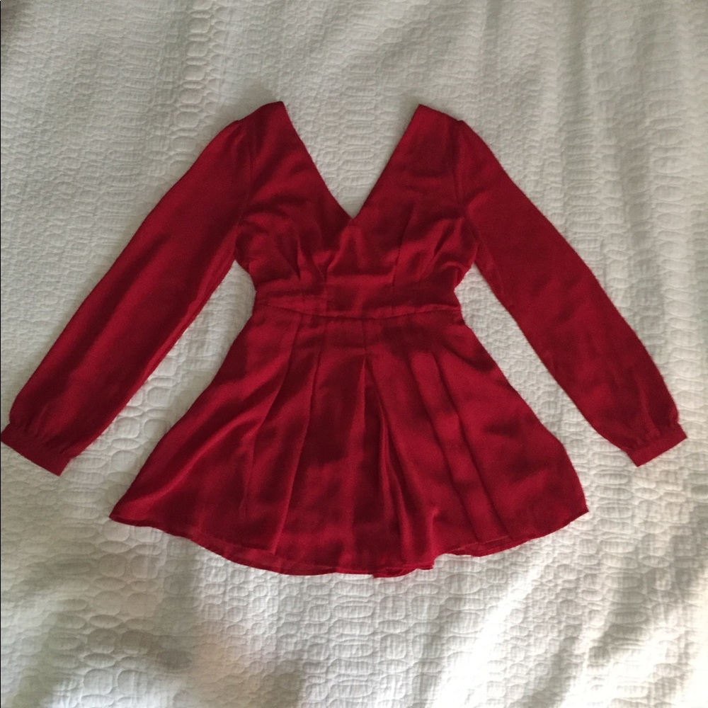 Long sleeved red romper