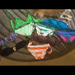 Various sizes mismatched swimsuit pieces.
