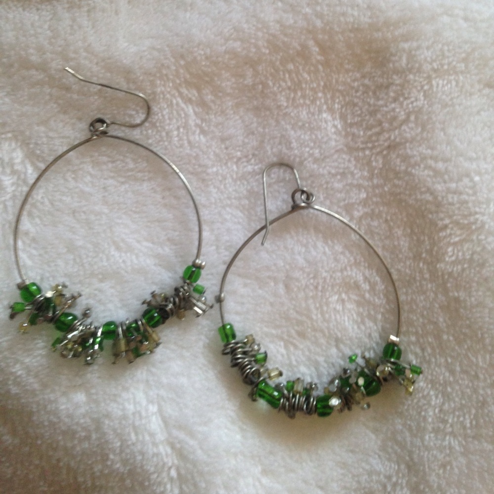 Hooped green earrings.