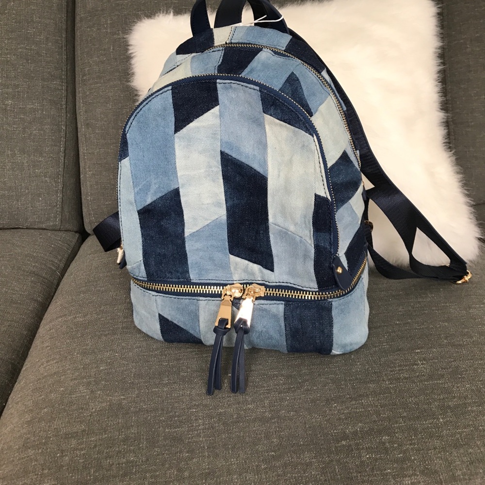 Multi patches denim and vegan leather backpack