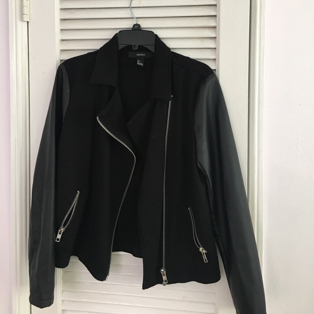 Jacket with leather sleeves