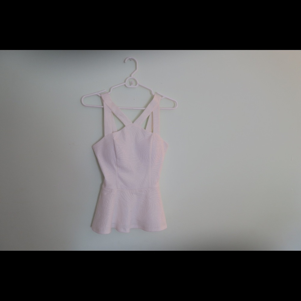 White peplum top