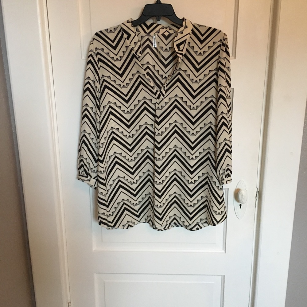 Cream and black tunic