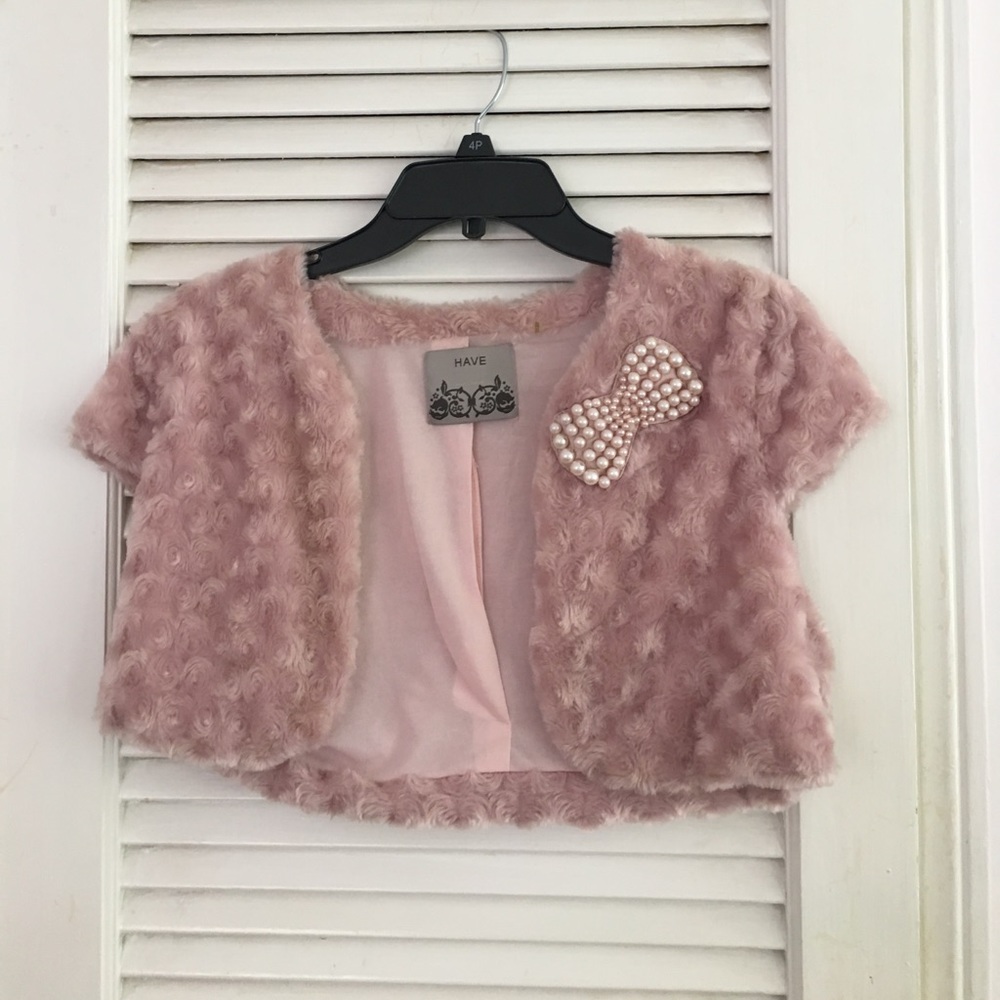 Light pink fur evening little jacket