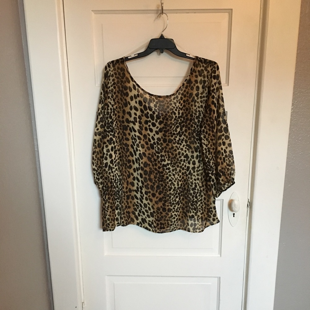 Cheetah print top with bow in back