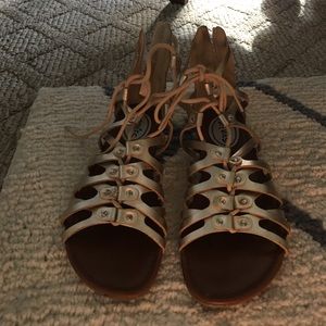 Stevie's gold gladiator sandals sold