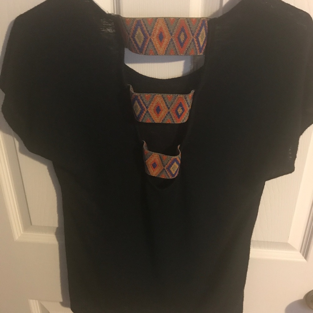Fun, black t-shirt with boho detail on back!