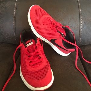 Boys red Nike shoes