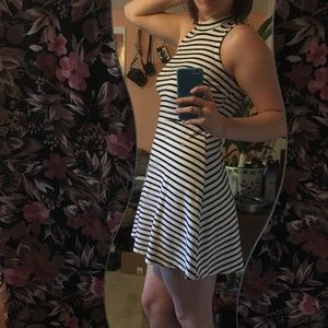 Striped, sleeveless, turtle necked dress