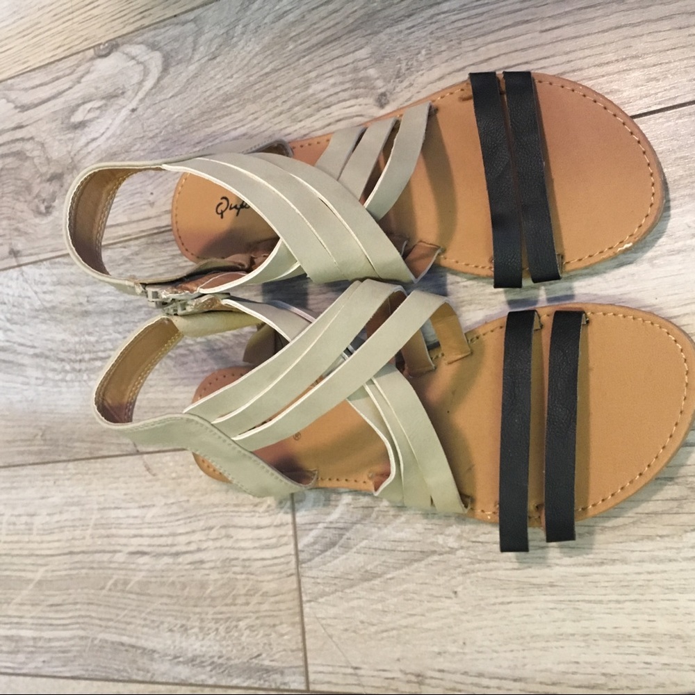 Tan and black strappy Gladiator sandals