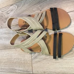 Tan and black strappy Gladiator sandals