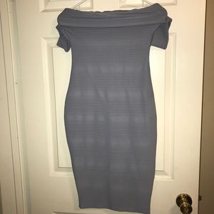Knee length fitted blue dress